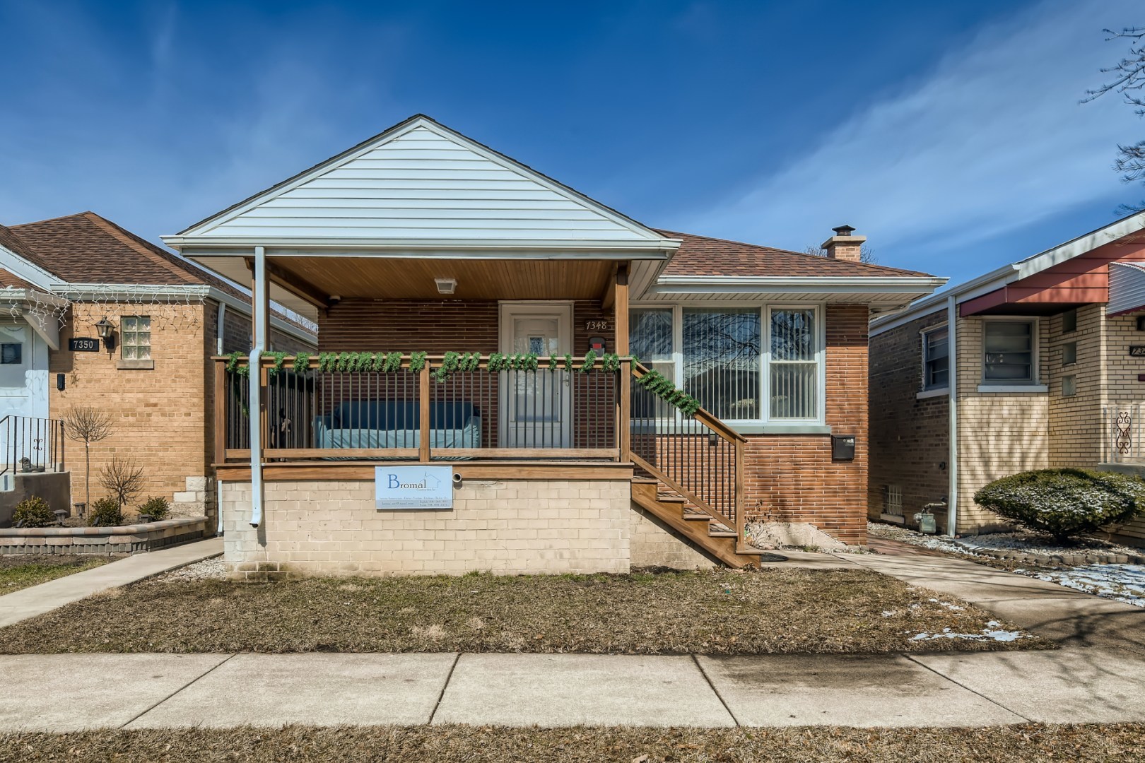 7348 62nd Place Summit, IL 60501 - Photo 1 of 1 a front view of a house with garden