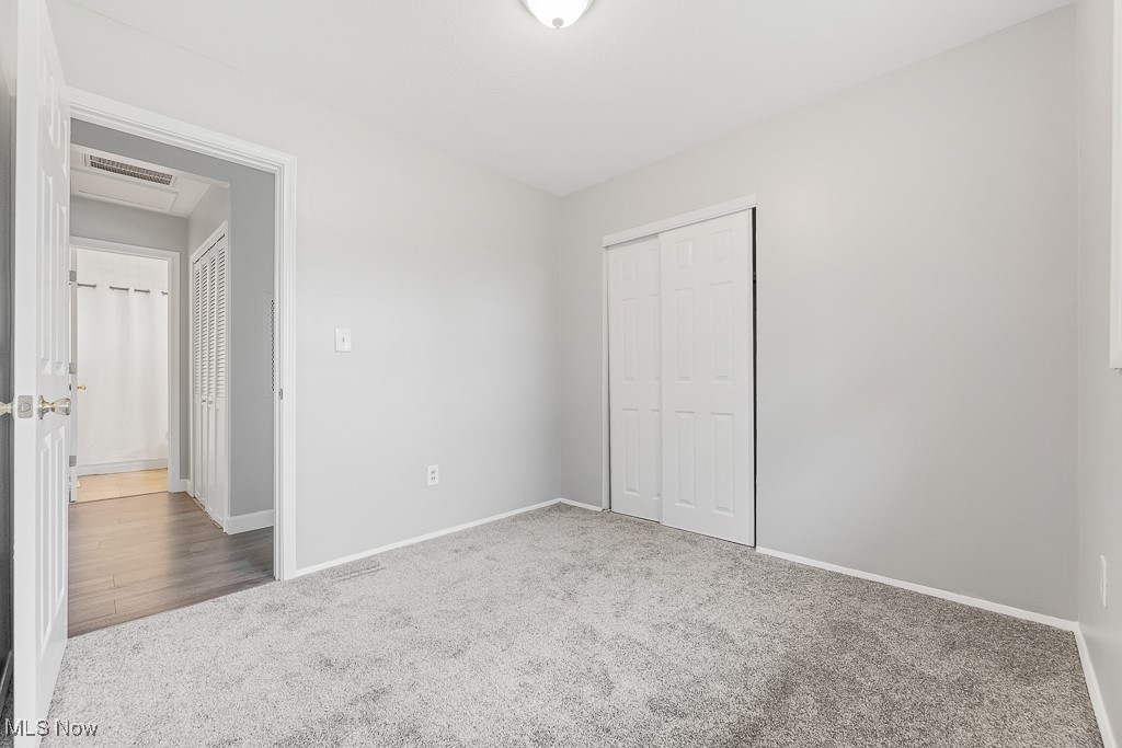 410 Longview Road Medina, OH 44256 - Photo 21 of 50 Unfurnished bedroom with carpet floors and a closet