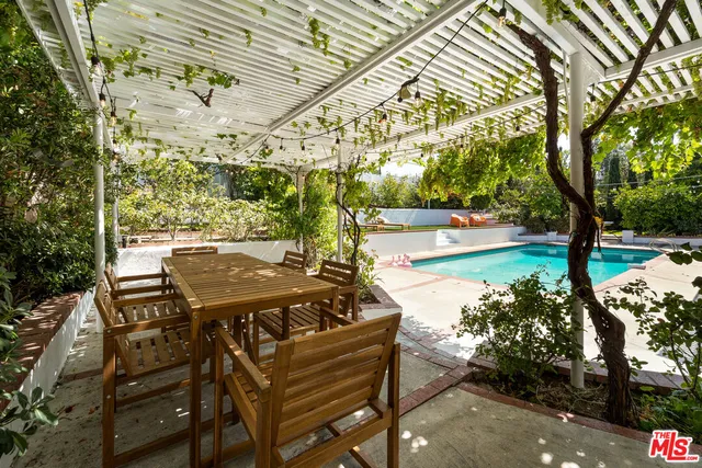 a view of backyard with green space