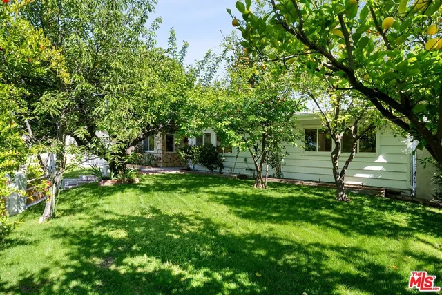 a picture of a bathroom with a shower