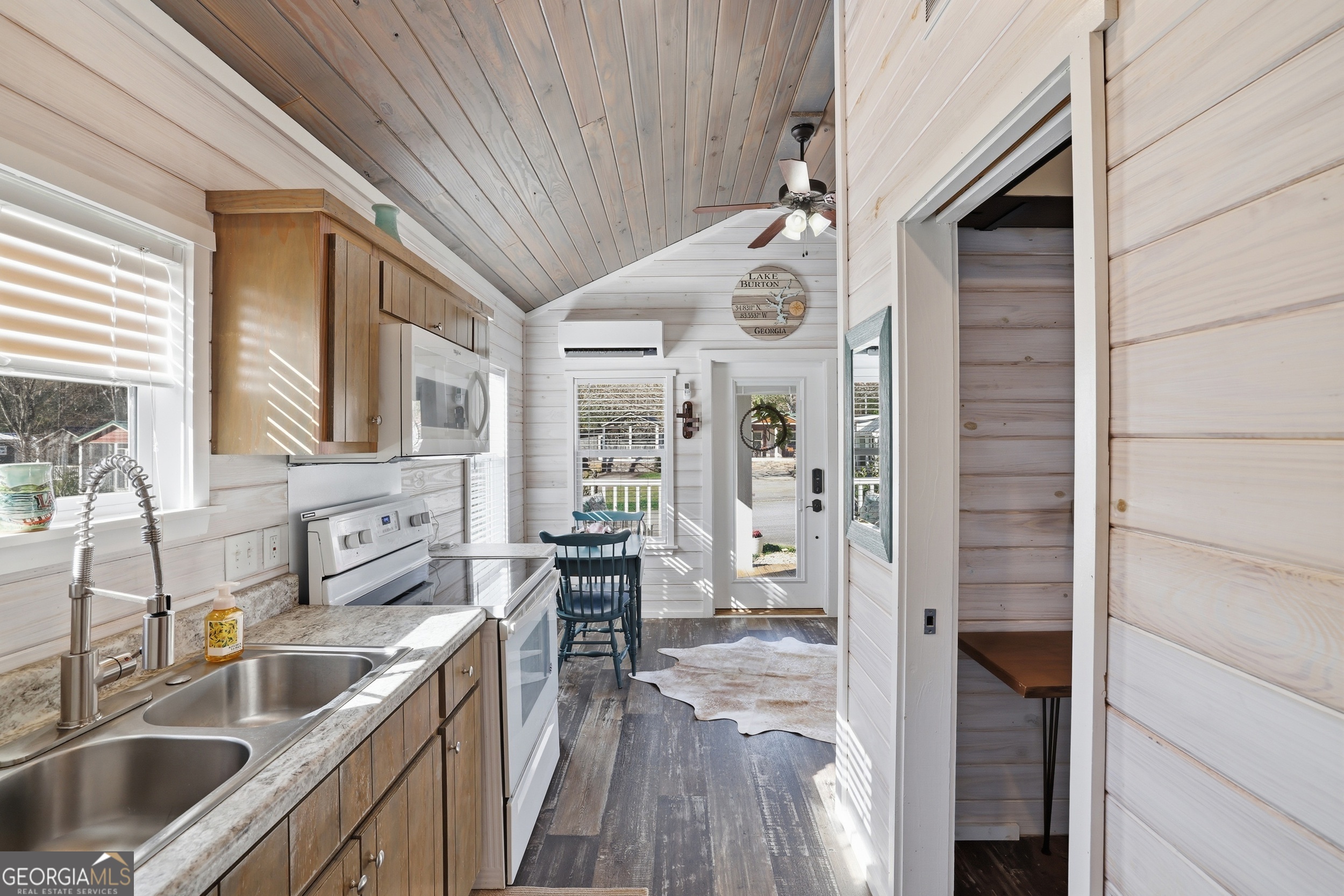 4960 Laurel Lodge Road, Unit 35 Clarkesville, GA 30523 - Photo 11 of 20 a kitchen that has a lot of cabinets in it