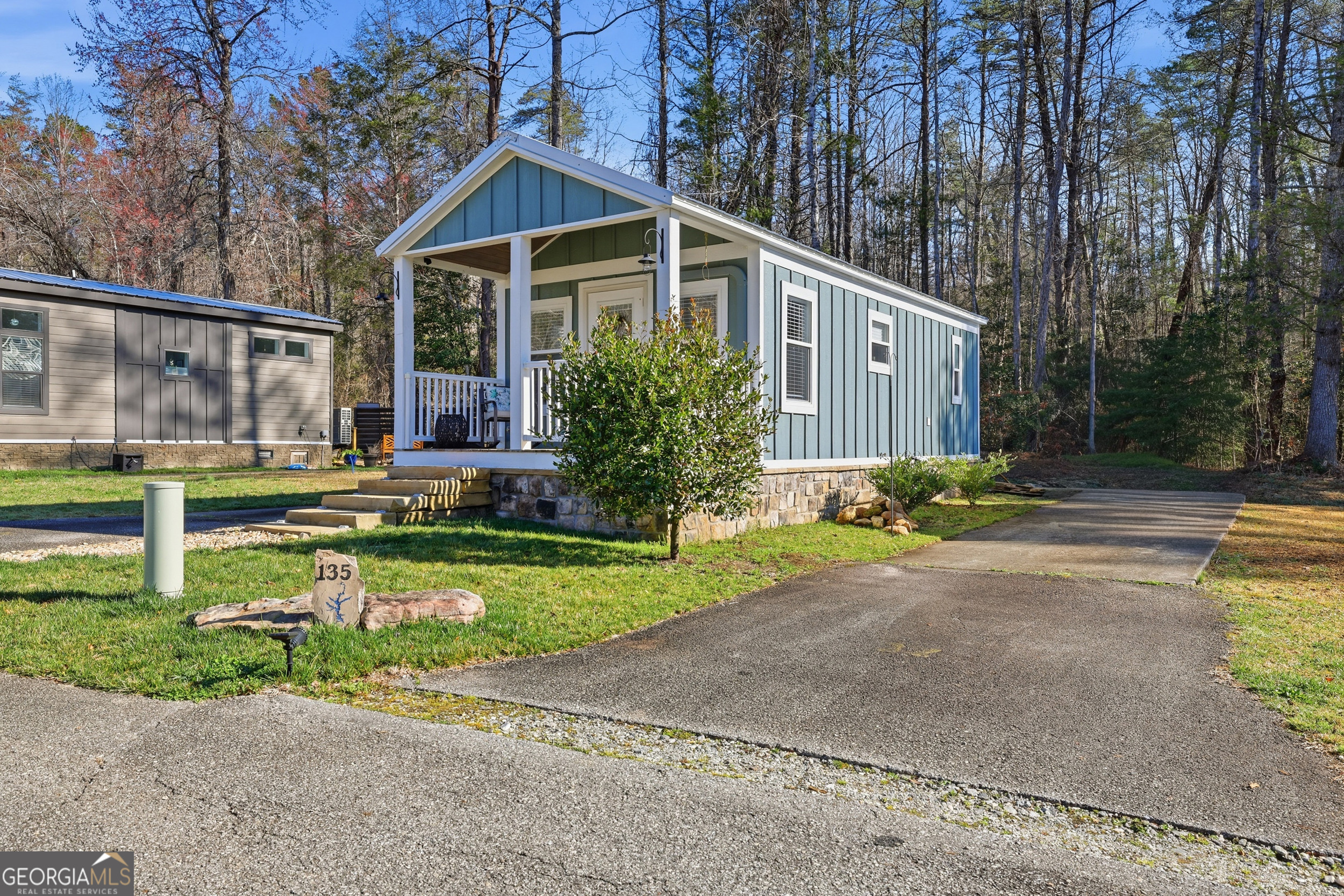 4960 Laurel Lodge Road, Unit 35 Clarkesville, GA 30523 - Photo 3 of 20 a front view of a house with a yard