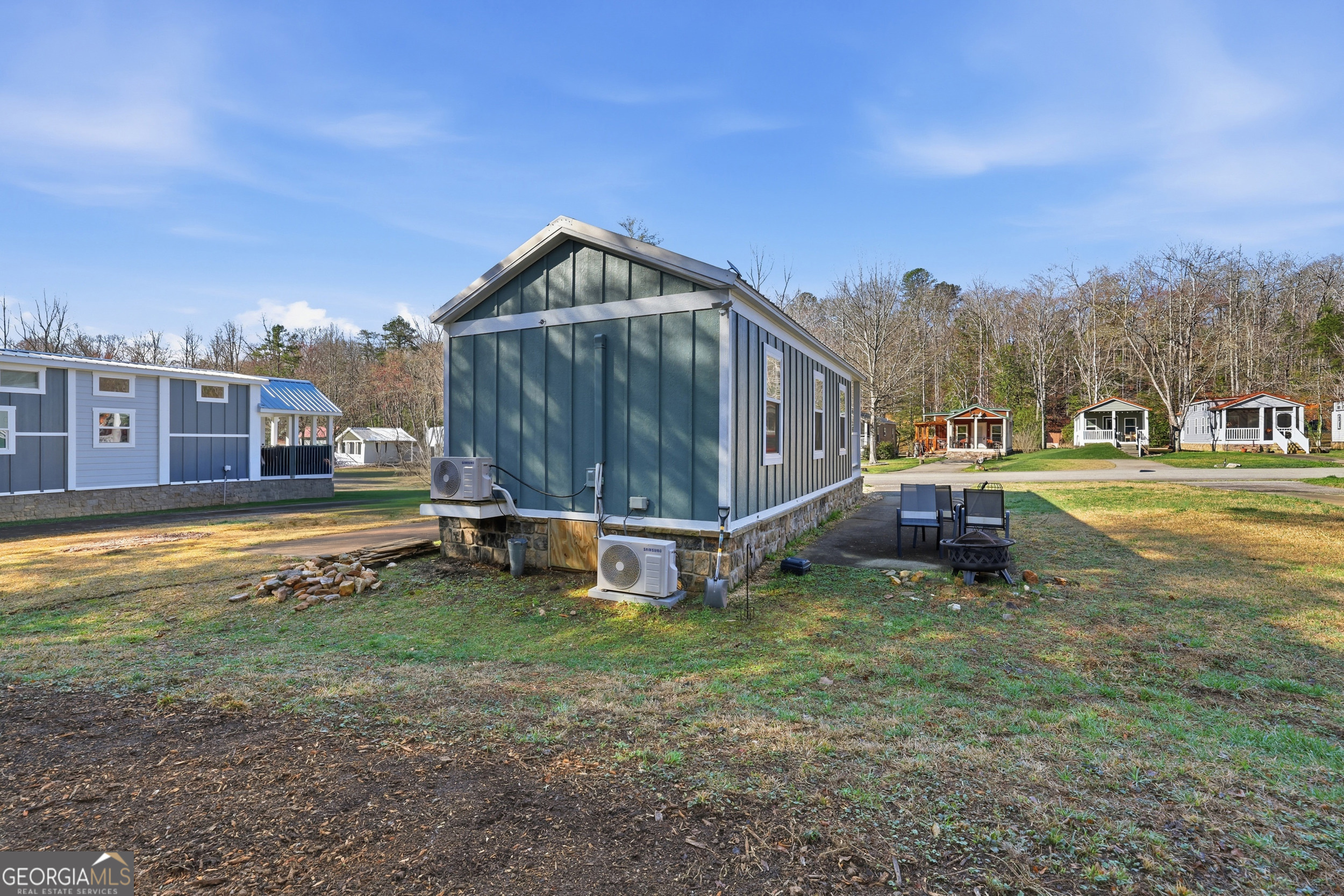 4960 Laurel Lodge Road, Unit 35 Clarkesville, GA 30523 - Photo 4 of 20 a view of a house with a yard