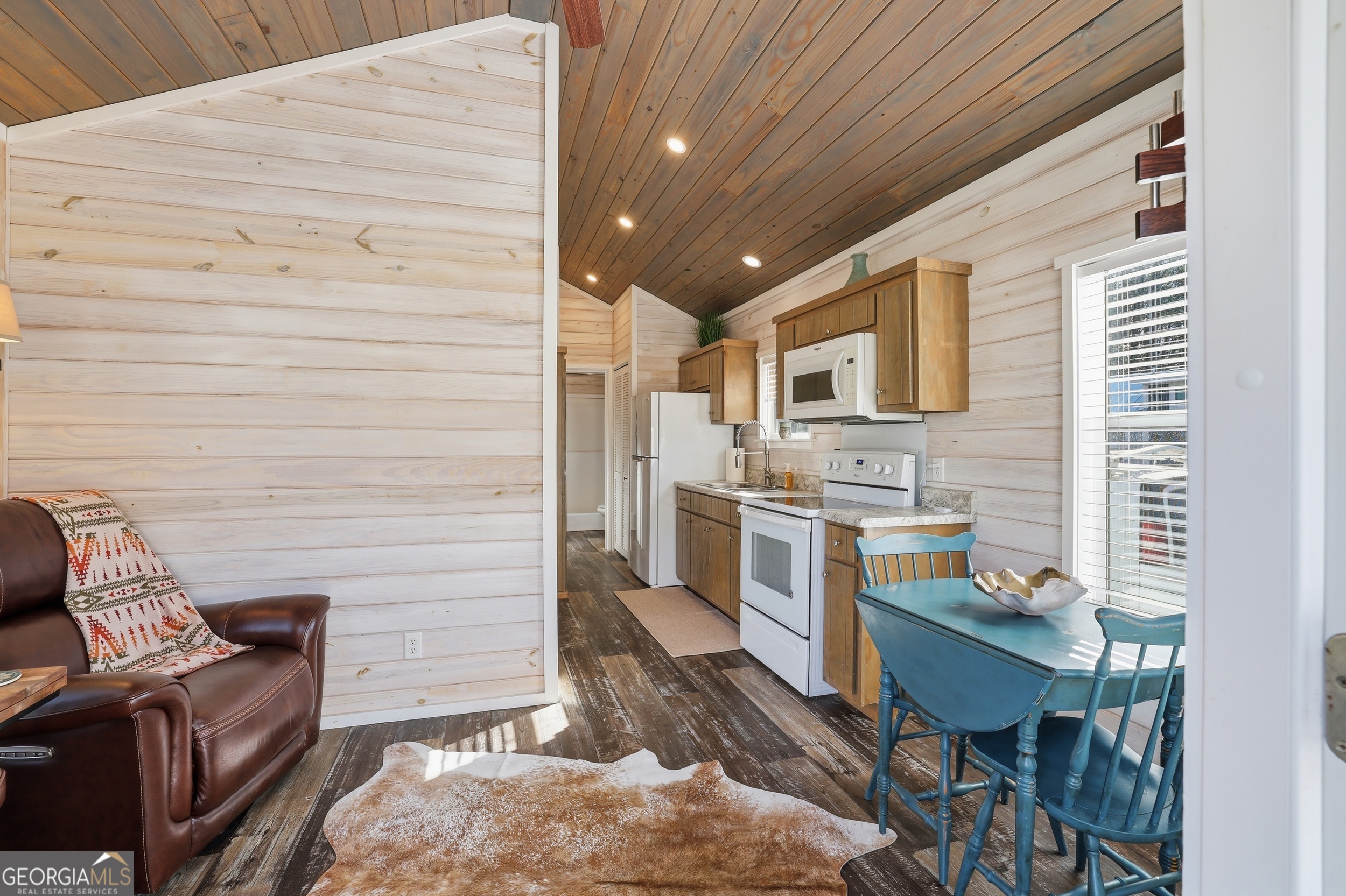 4960 Laurel Lodge Road, Unit 35 Clarkesville, GA 30523 - Photo 7 of 20 a workspace with furniture and a kitchen