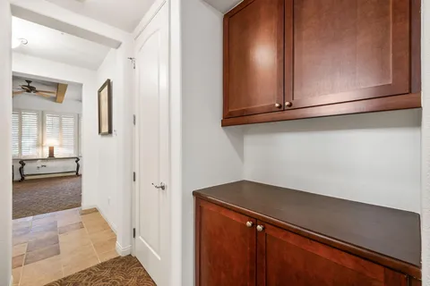 a bedroom with a bed and a fireplace