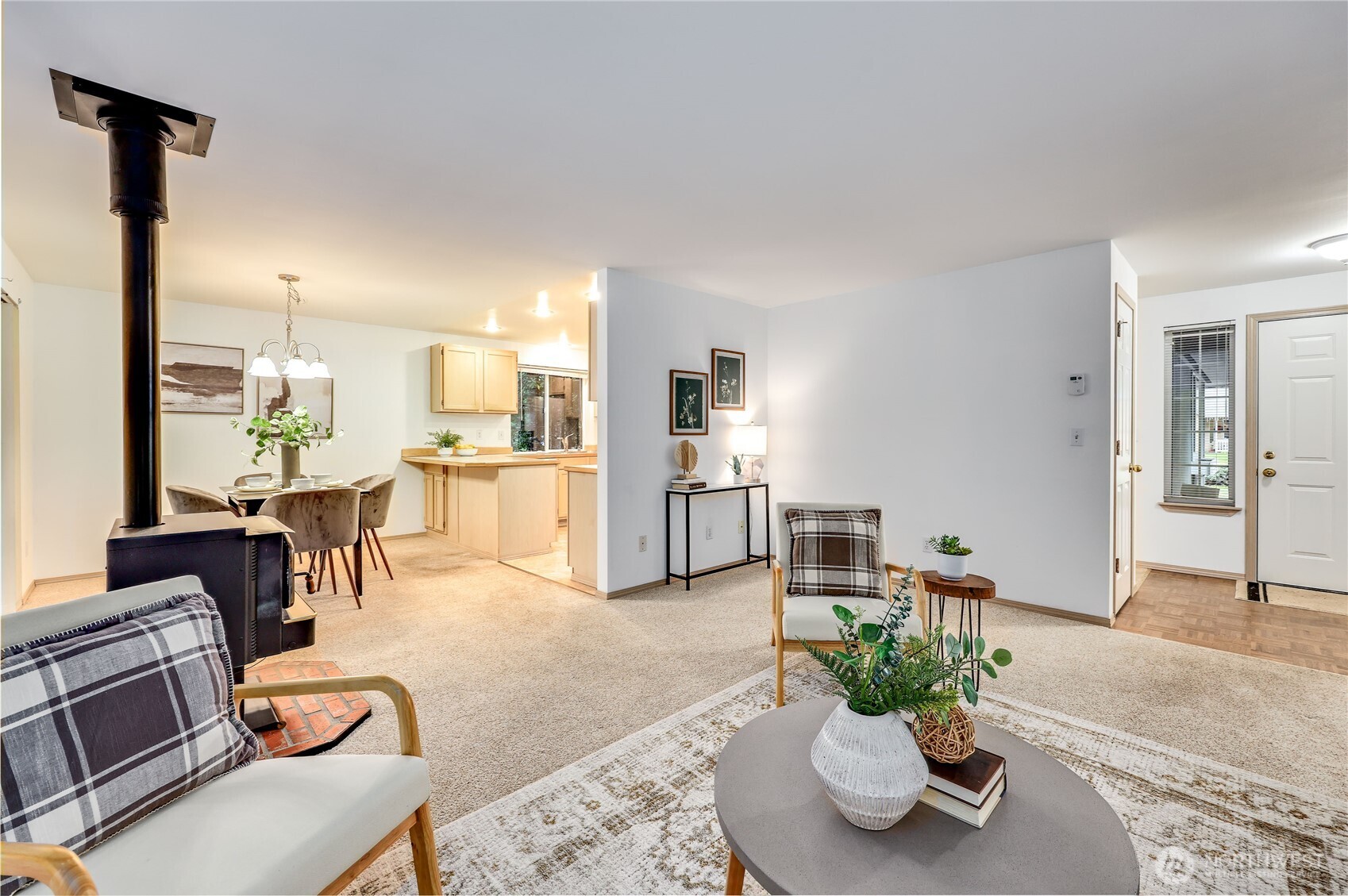 43 Rhody Court Chimacum, WA 98325 - Photo 13 of 37 a living room with furniture potted plant and kitchen view