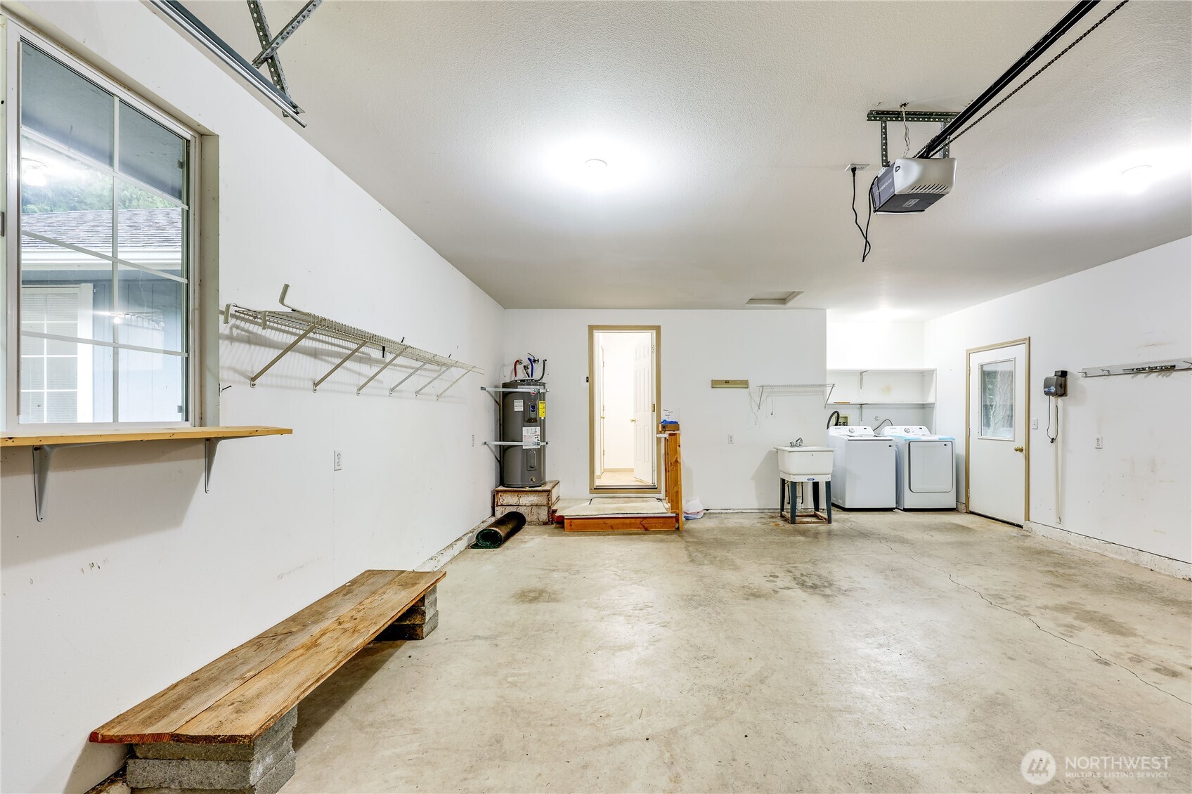 43 Rhody Court Chimacum, WA 98325 - Photo 20 of 37 a view of a room with gym equipment and windows