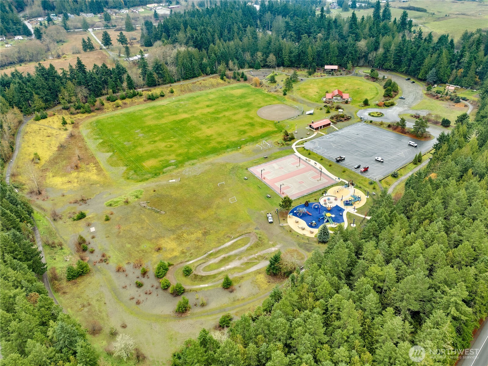 43 Rhody Court Chimacum, WA 98325 - Photo 35 of 37 a view of an swimming pool with a yard