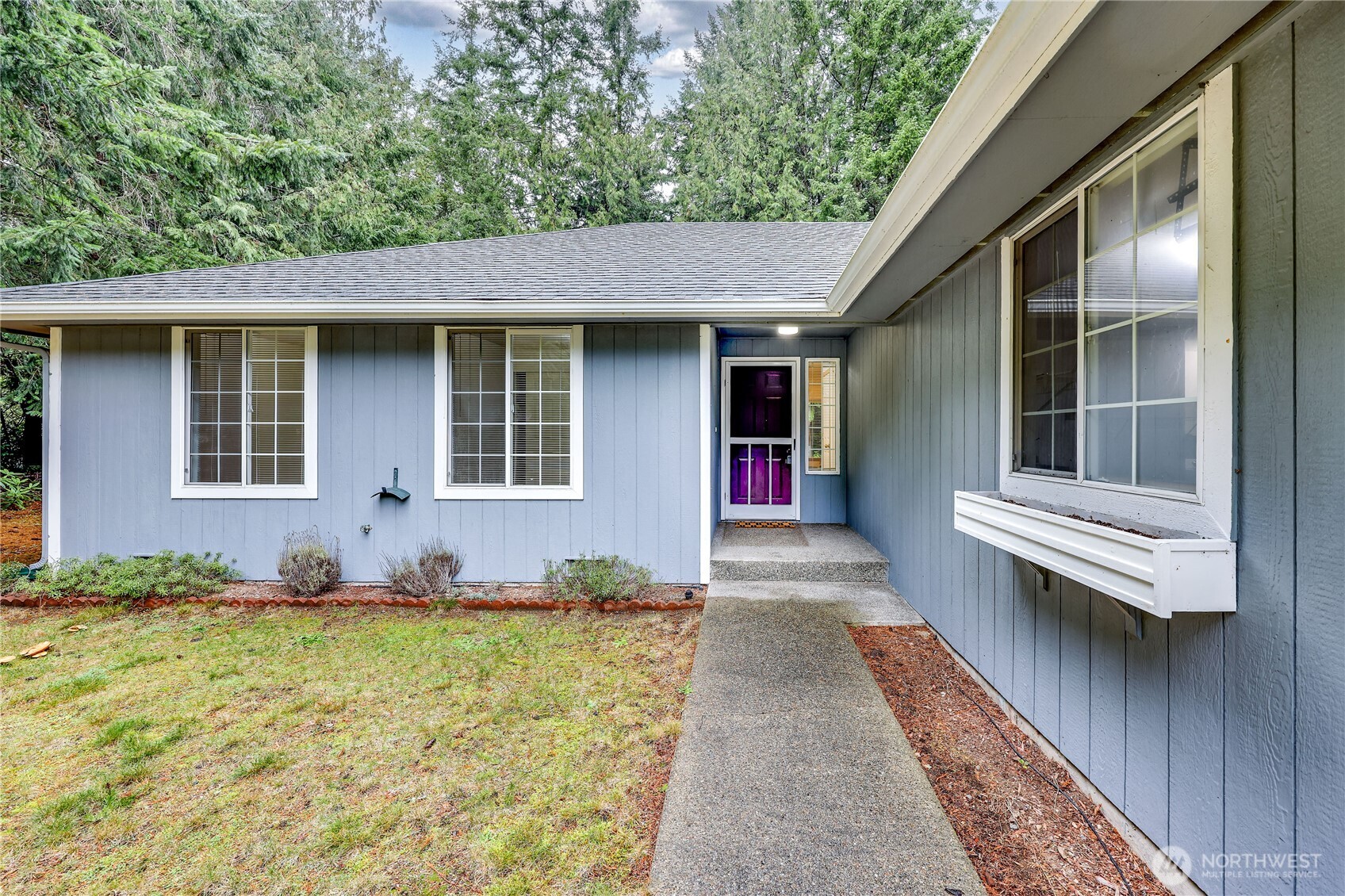 43 Rhody Court Chimacum, WA 98325 - Photo 9 of 37 a front view of a house with a yard