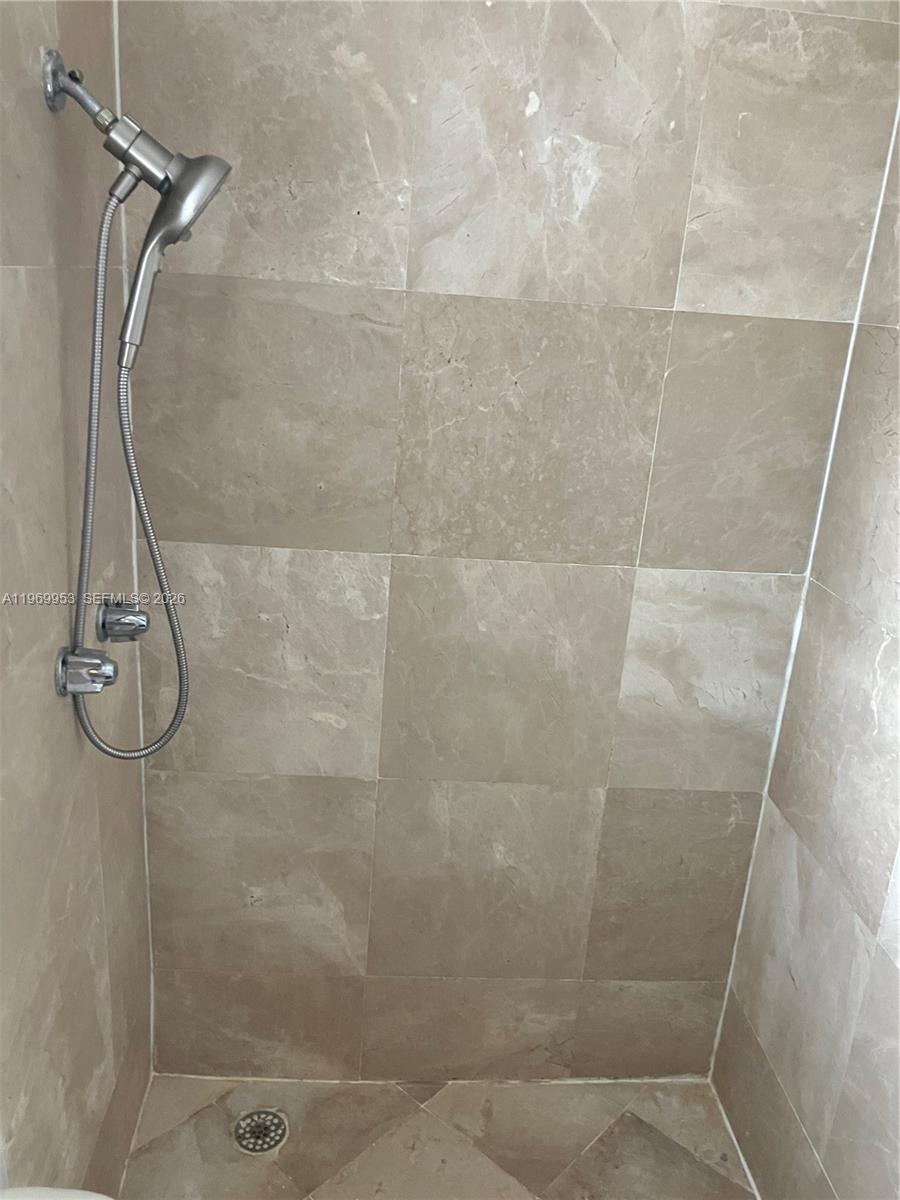 5730 Southwest 37th Street Davie, FL 33314 - Photo 13 of 20 a bathroom with a shower