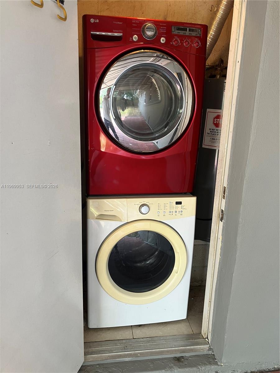 5730 Southwest 37th Street Davie, FL 33314 - Photo 17 of 20 a utility room with dryer and washer