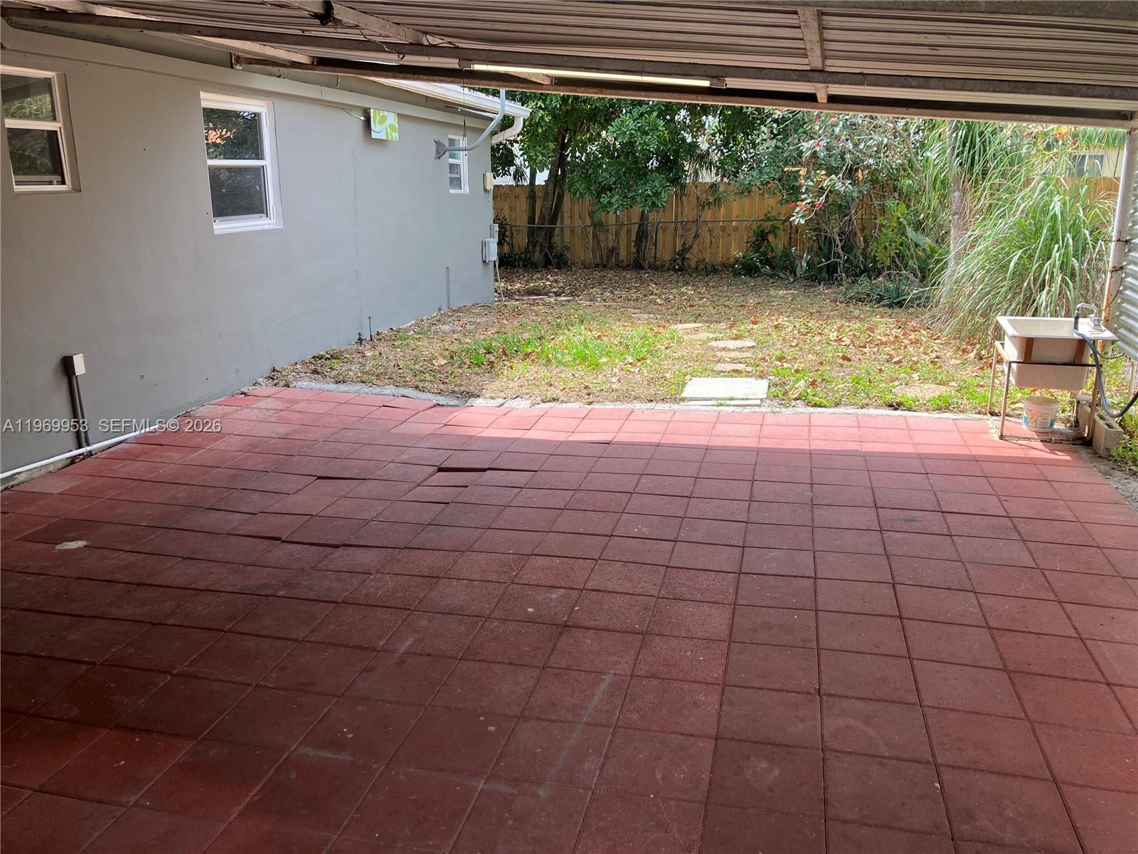 5730 Southwest 37th Street Davie, FL 33314 - Photo 19 of 20 a view of a backyard of the house