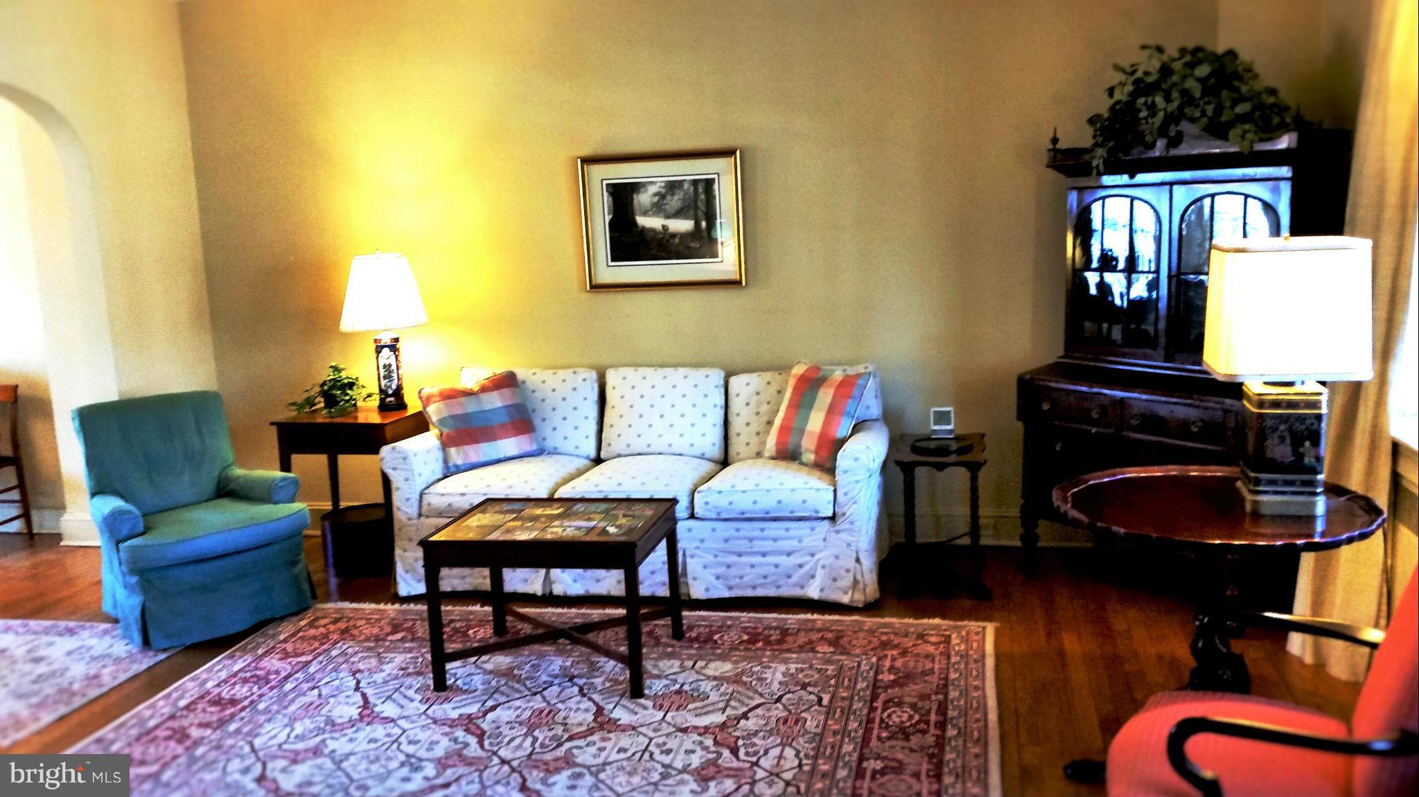 225 Hopkins Road Baltimore, MD 21212 - Photo 2 of 28 a living room with furniture and wooden floor