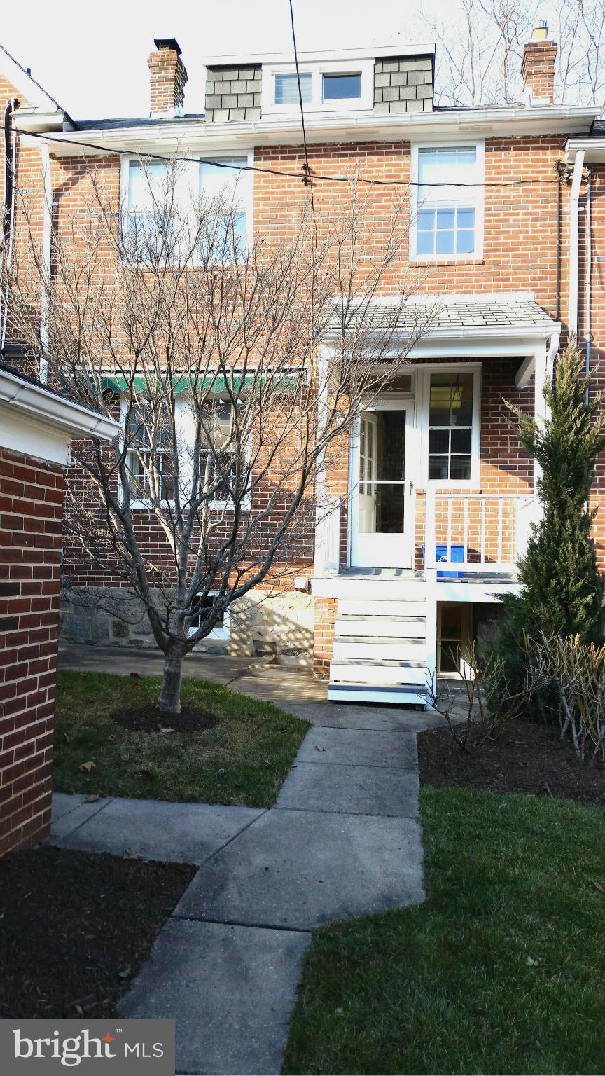 225 Hopkins Road Baltimore, MD 21212 - Photo 28 of 28 a front view of a house with a yard