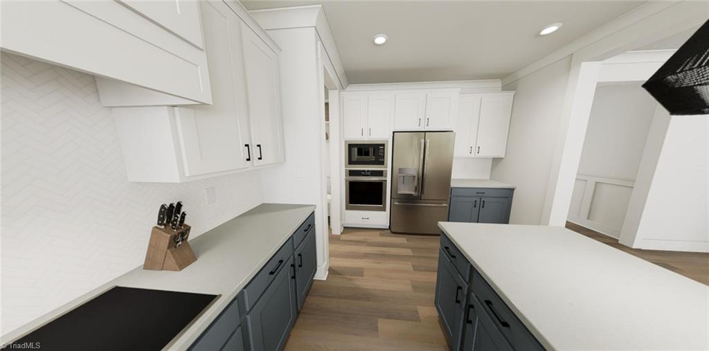 6718 Honeycutt Reserve Drive Oak Ridge, NC 27310 - Photo 8 of 21 Kitchen-Virtual Representation Not actual home - Some Features may be different in actual home.