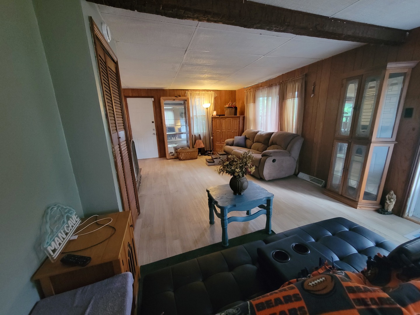 783 North 2853rd Road Utica, IL 61373 - Photo 9 of 26 a living room with furniture and wooden floor