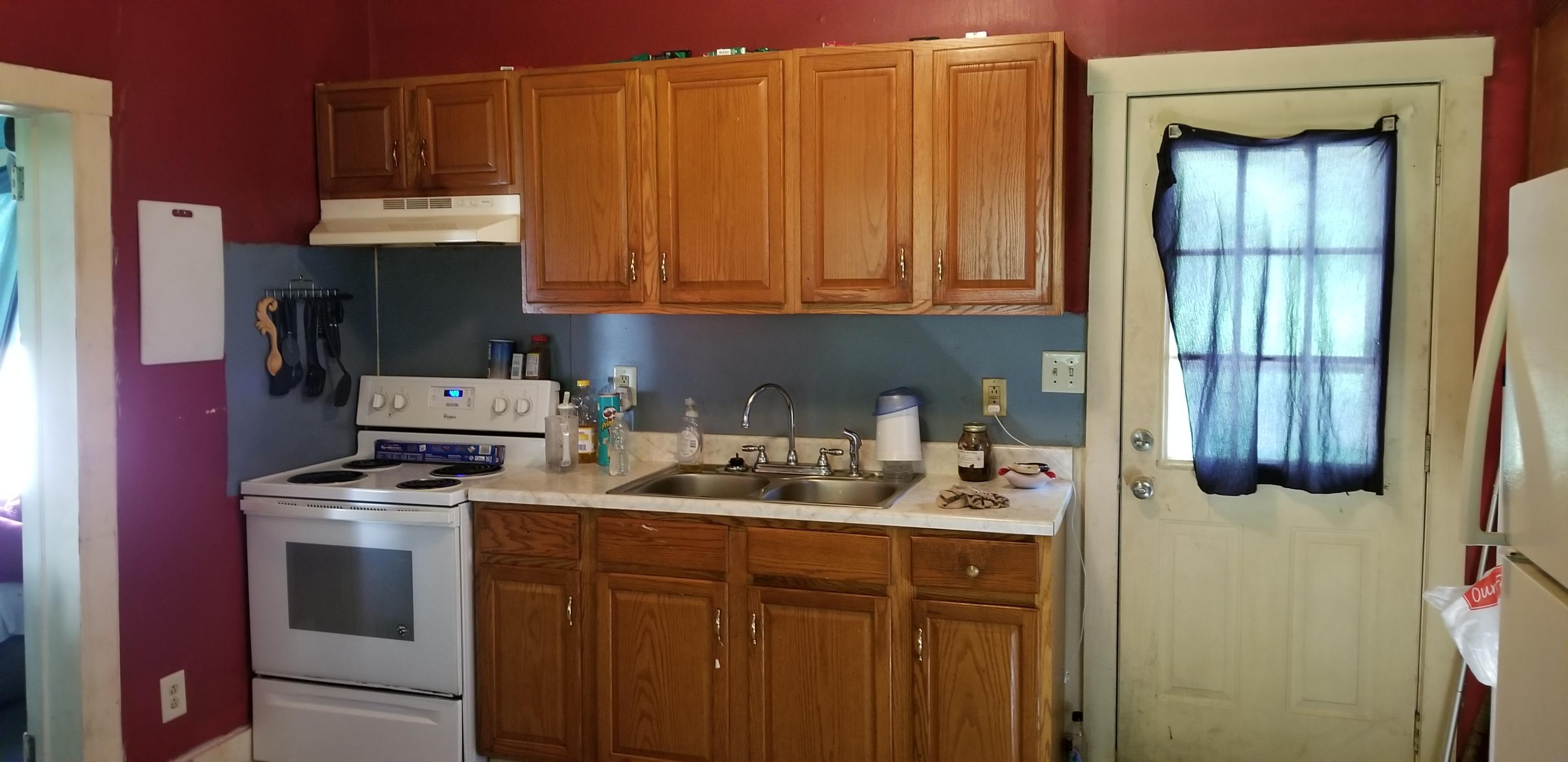 24 Woodcott Road, Unit 26 Ferrum, VA 24088 - Photo 3 of 12 a kitchen with stainless steel appliances granite countertop a refrigerator sink and cabinets