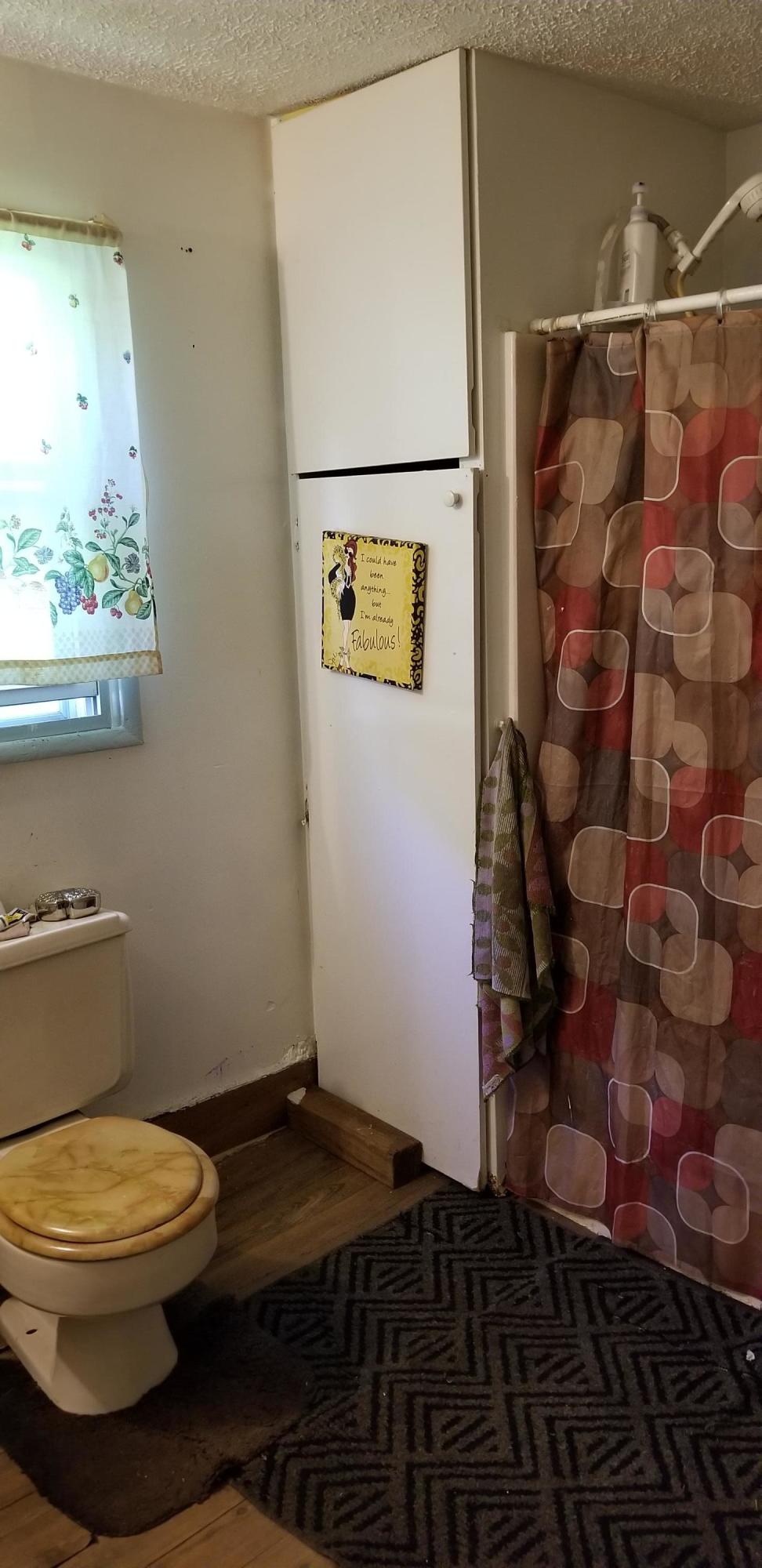 24 Woodcott Road, Unit 26 Ferrum, VA 24088 - Photo 5 of 12 a bathroom with a toilet and a shower
