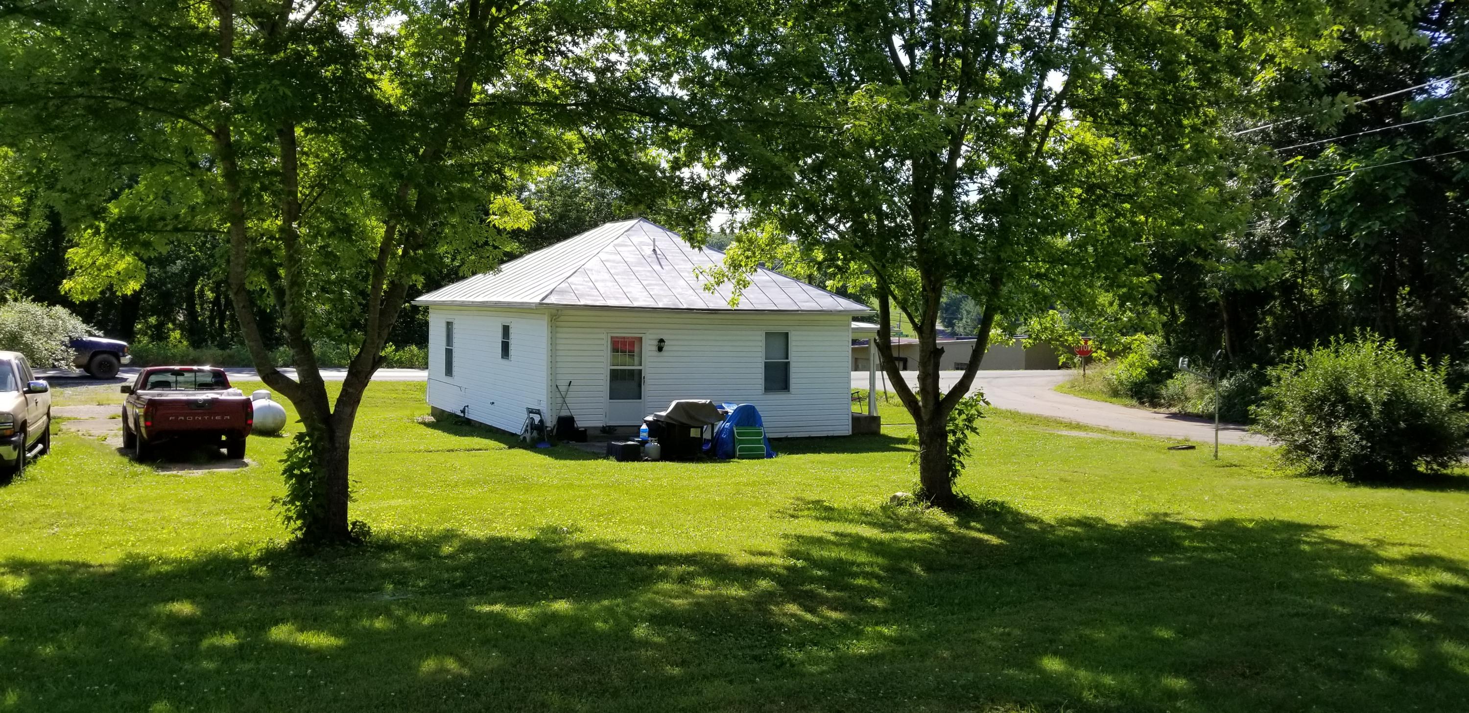 24 Woodcott Road, Unit 26 Ferrum, VA 24088 - Photo 8 of 12 a view of a house with backyard and sitting area