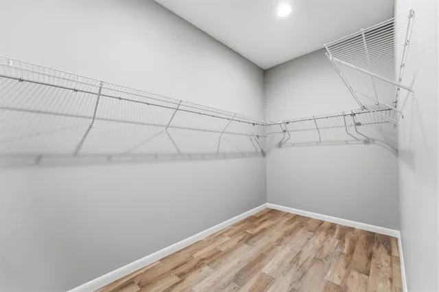 a view of a room with racks on the wall