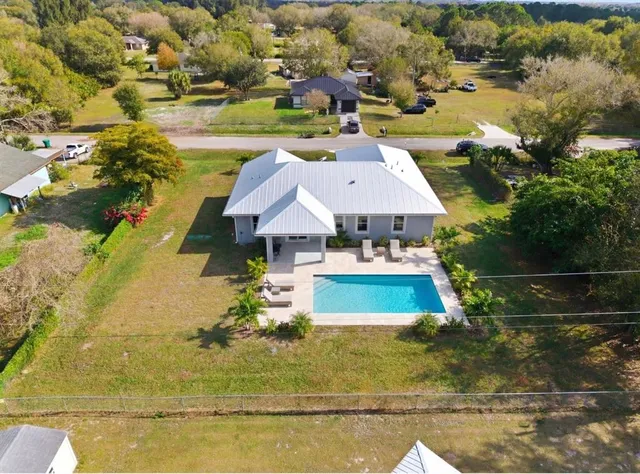 a house with a yard in front of it