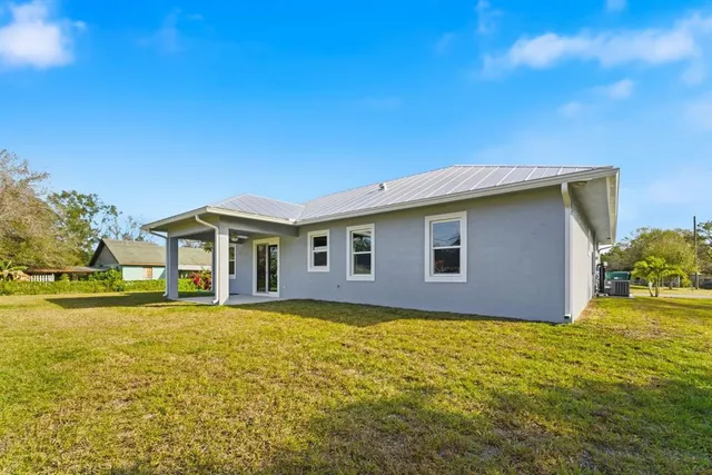 a view of a house with a ocean view