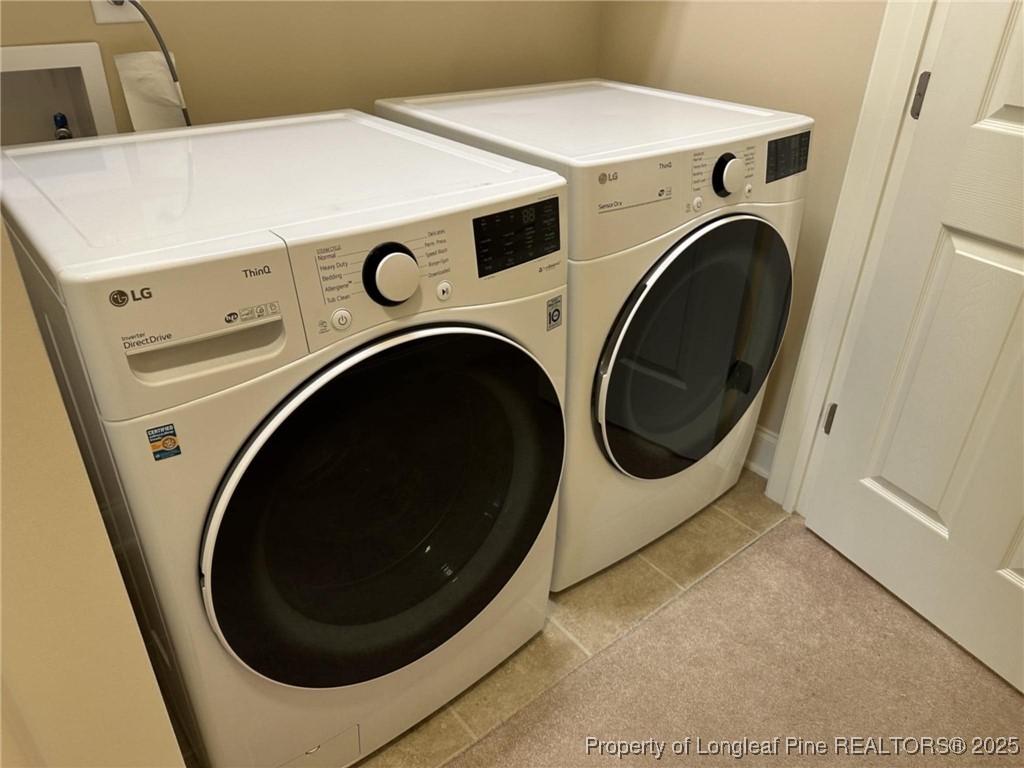 158 Gallery Drive, Unit 202 Spring Lake, NC 28390 - Photo 14 of 22 a utility room with dryer and washer