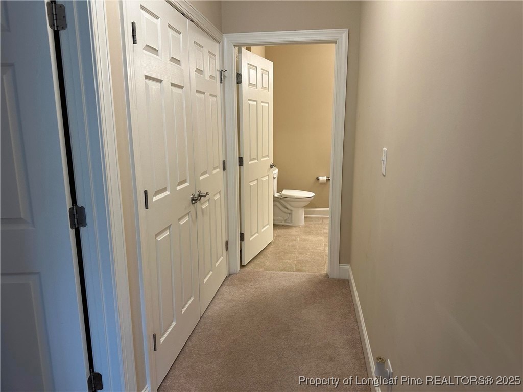 158 Gallery Drive, Unit 202 Spring Lake, NC 28390 - Photo 15 of 22 a view of a bathroom from a hallway