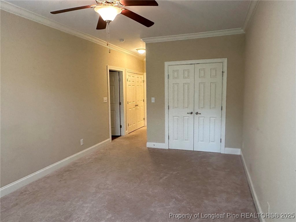 158 Gallery Drive, Unit 202 Spring Lake, NC 28390 - Photo 16 of 22 en empty room with fan and window