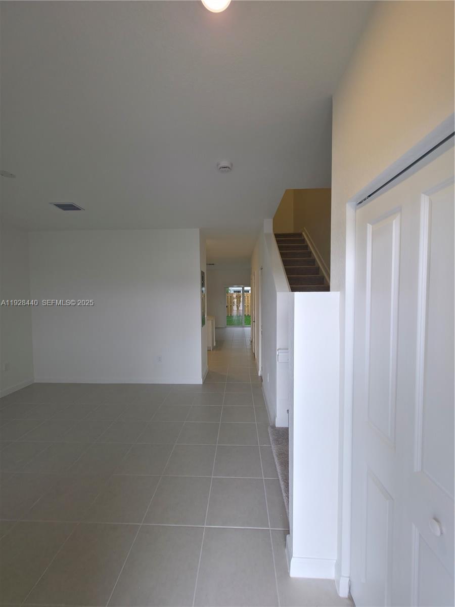 35687 Southwest 178th Court Homestead, FL 33034 - Photo 2 of 28 a view of a hallway