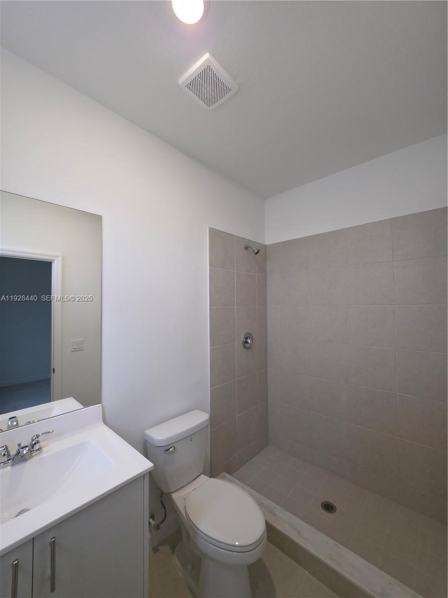 35687 Southwest 178th Court Homestead, FL 33034 - Photo 21 of 28 a bathroom with a sink a toilet and shower