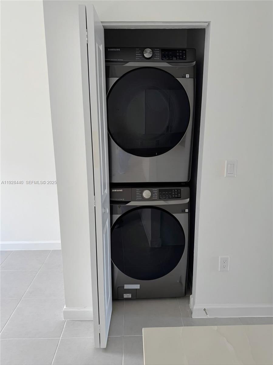 35687 Southwest 178th Court Homestead, FL 33034 - Photo 27 of 28 a utility room with dryer and washer