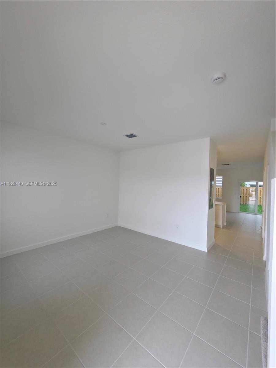 35687 Southwest 178th Court Homestead, FL 33034 - Photo 3 of 28 a view of an empty room