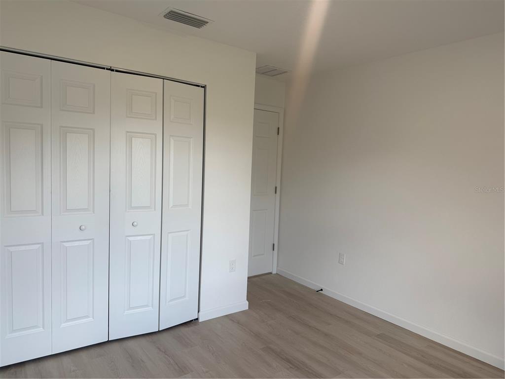12847 Southwest 84th Terrace Road Ocala, FL 34473 - Photo 10 of 16 a view of an empty room