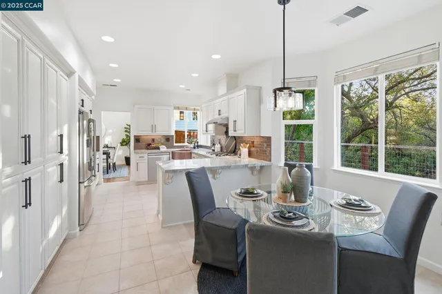 a bedroom with bed and a fireplace