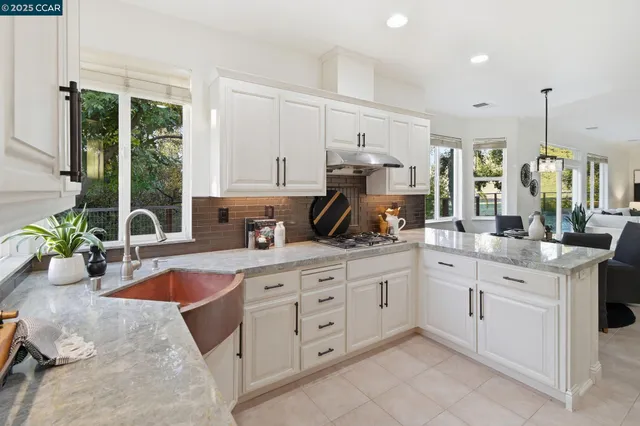 a bathroom with a sink a mirror and a bathtub