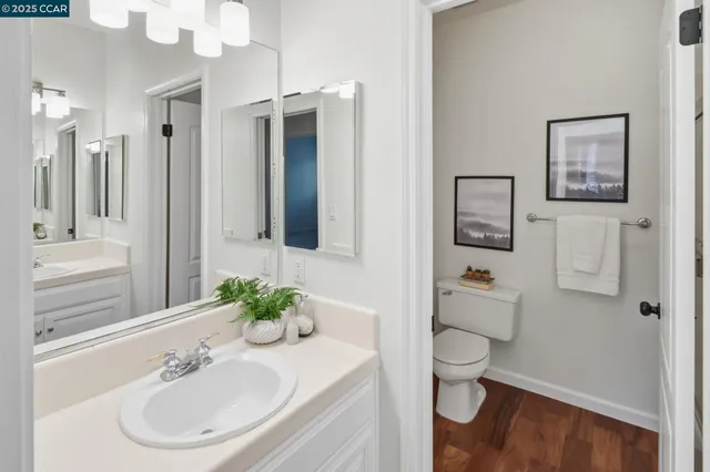 a kitchen with a sink cabinets and microwave