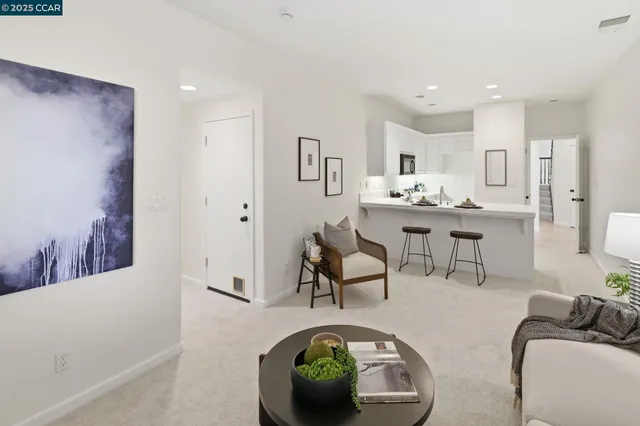 a bedroom with a bed and a mirror