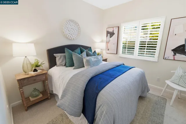 an aerial view of a house with a lake view