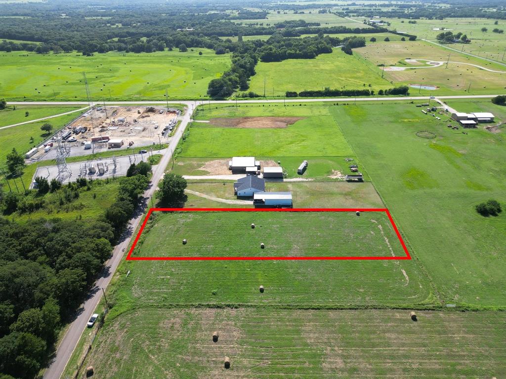 8 Arkansas Road Sadler, TX 76264 - Photo 8 of 8 a view of a lake with a big yard