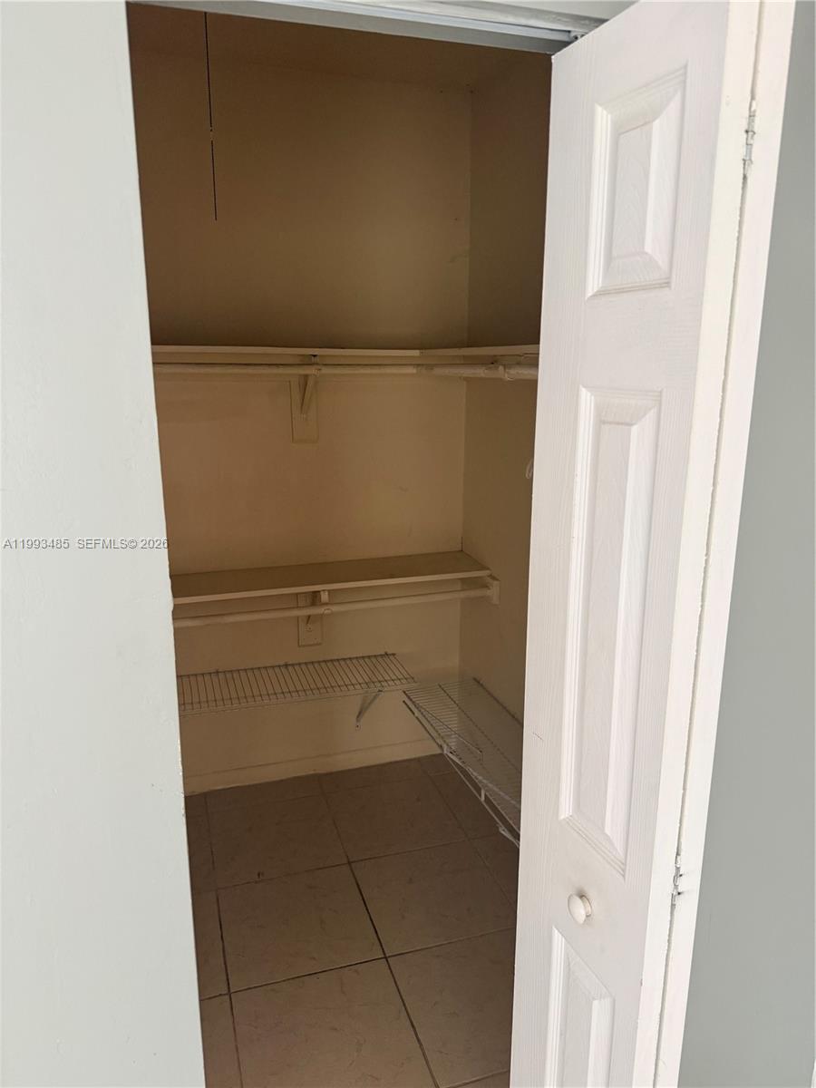 26468 Southwest 123rd Place Homestead, FL 33032 - Photo 15 of 33 a refrigerator freezer and a dishwasher in a kitchen