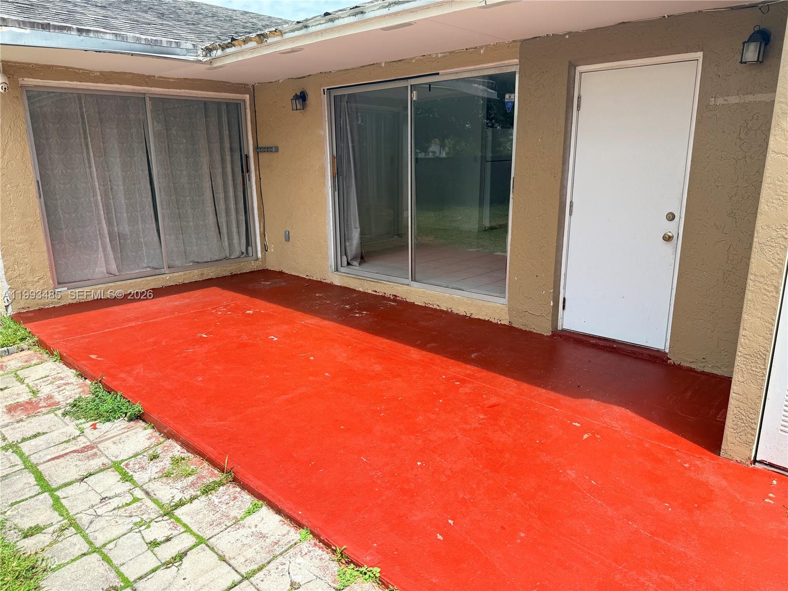 26468 Southwest 123rd Place Homestead, FL 33032 - Photo 26 of 33 a view of swimming pool with an outdoor space