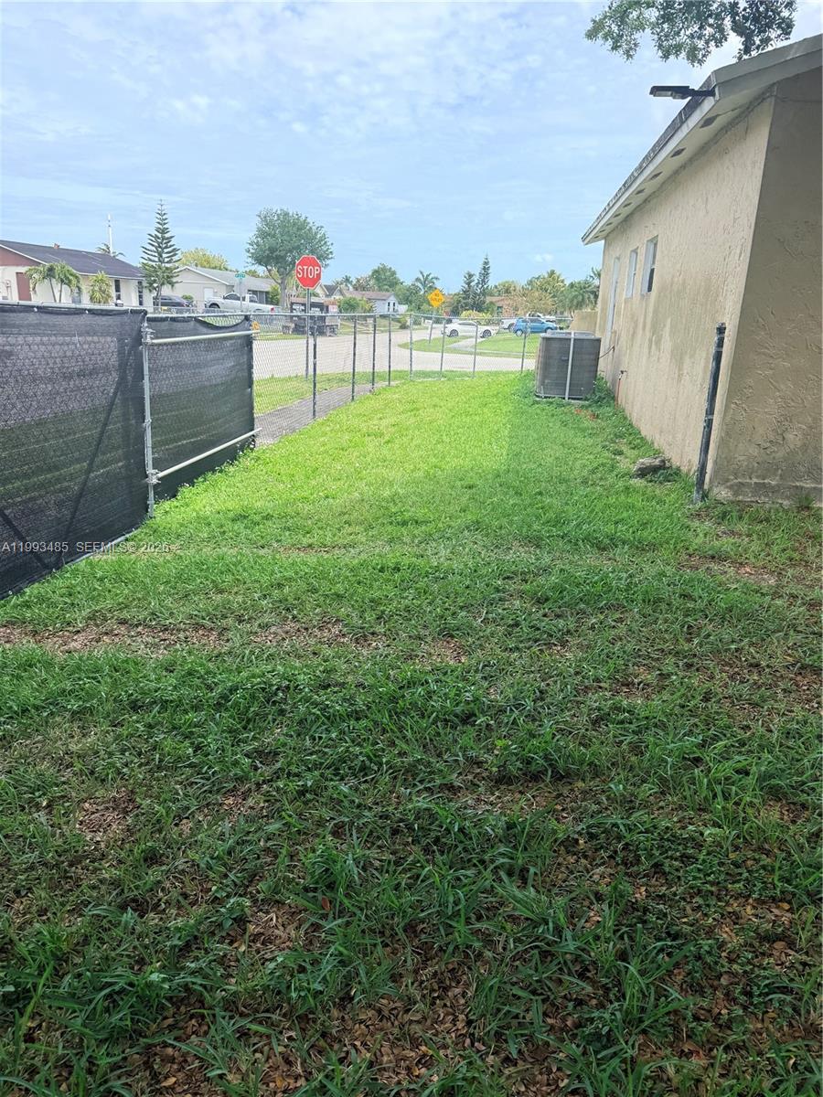 26468 Southwest 123rd Place Homestead, FL 33032 - Photo 29 of 33 a view of yard from a balcony