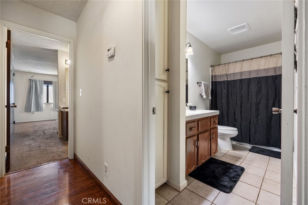 9068 Montero Road Valley Springs, CA 95252 - Photo 23 of 50 a bathroom with a sink a toilet and shower