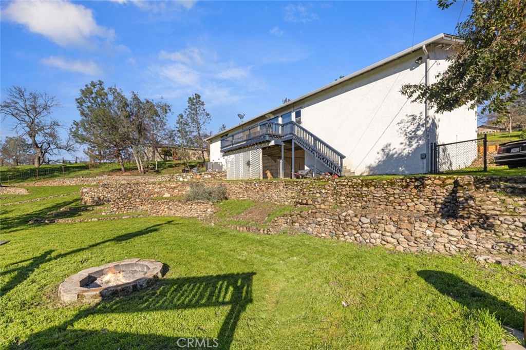 9068 Montero Road Valley Springs, CA 95252 - Photo 32 of 50 a view of a house with a yard