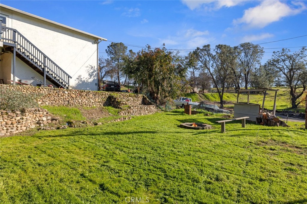 9068 Montero Road Valley Springs, CA 95252 - Photo 33 of 50 a view of backyard with swimming pool and sitting area