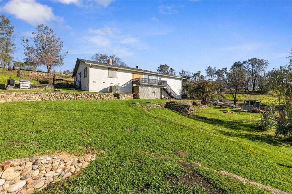 9068 Montero Road Valley Springs, CA 95252 - Photo 34 of 50 a house view with a big yard