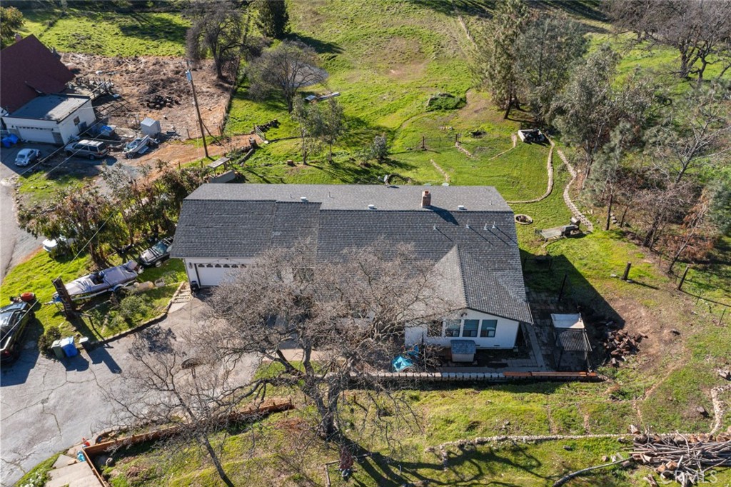 9068 Montero Road Valley Springs, CA 95252 - Photo 40 of 50 a view of a house with a yard