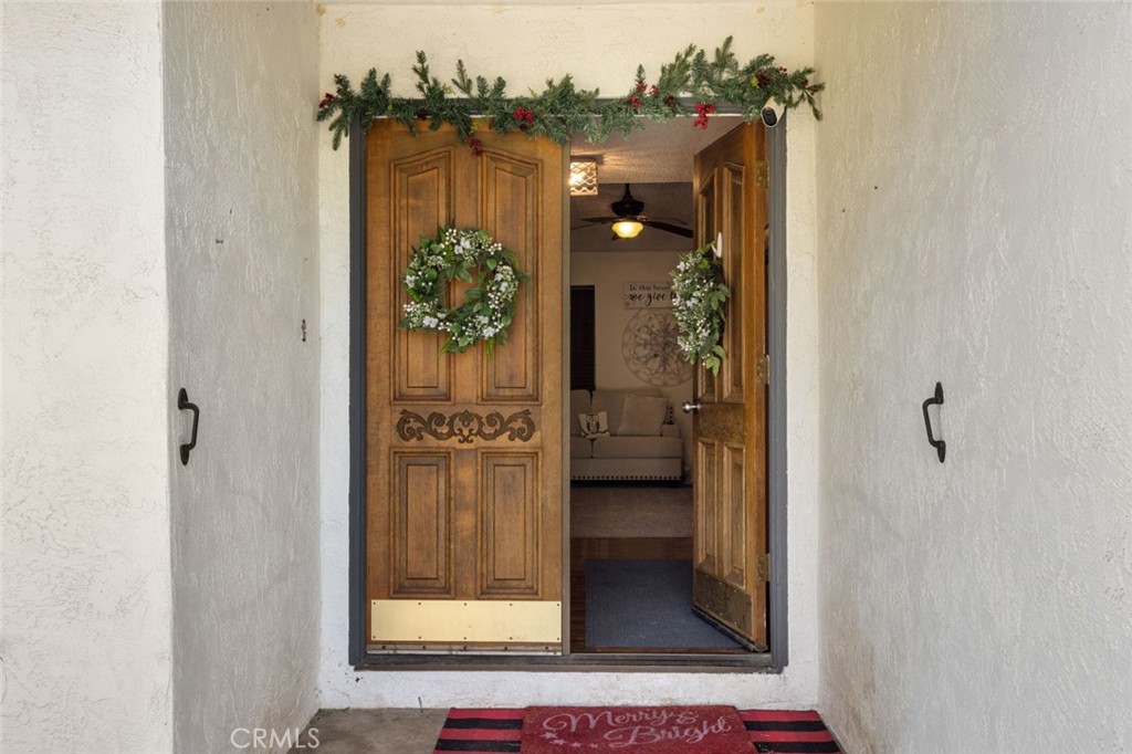 9068 Montero Road Valley Springs, CA 95252 - Photo 4 of 50 a view of a hallway with a door