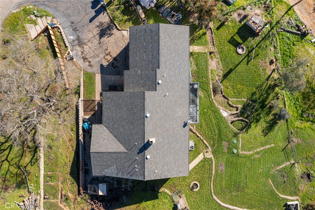 9068 Montero Road Valley Springs, CA 95252 - Photo 41 of 50 an aerial view of a house with a swimming pool